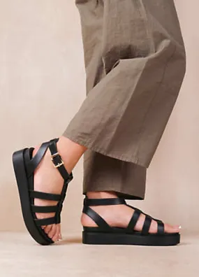 Where’s That From Dubai Mid Platform Gladiator Strap Sandals in Black PU Look Again