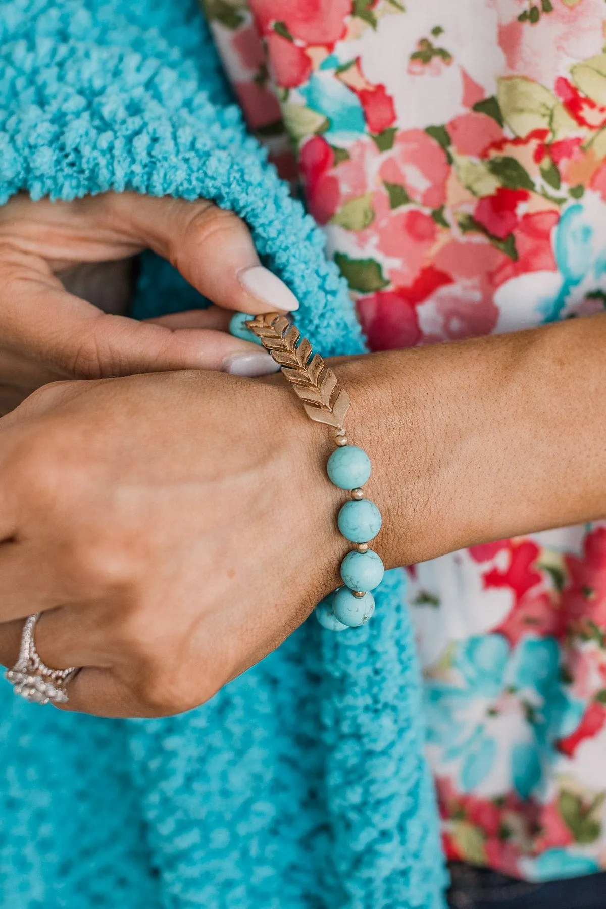 Turquoise Beaded Bracelet with Single Feather Pendant